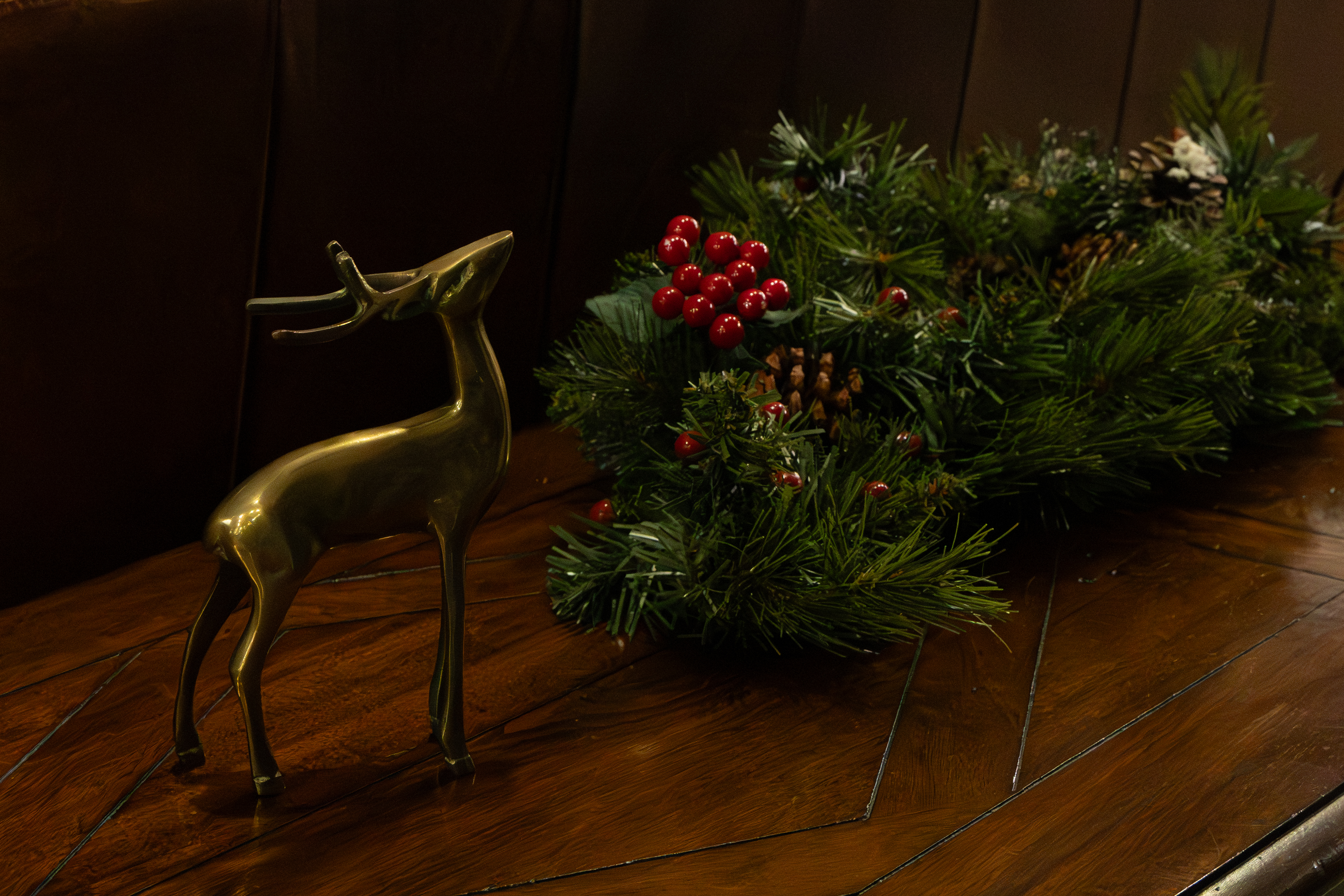 Gold decorate deer and garland at the Habitat ReStore