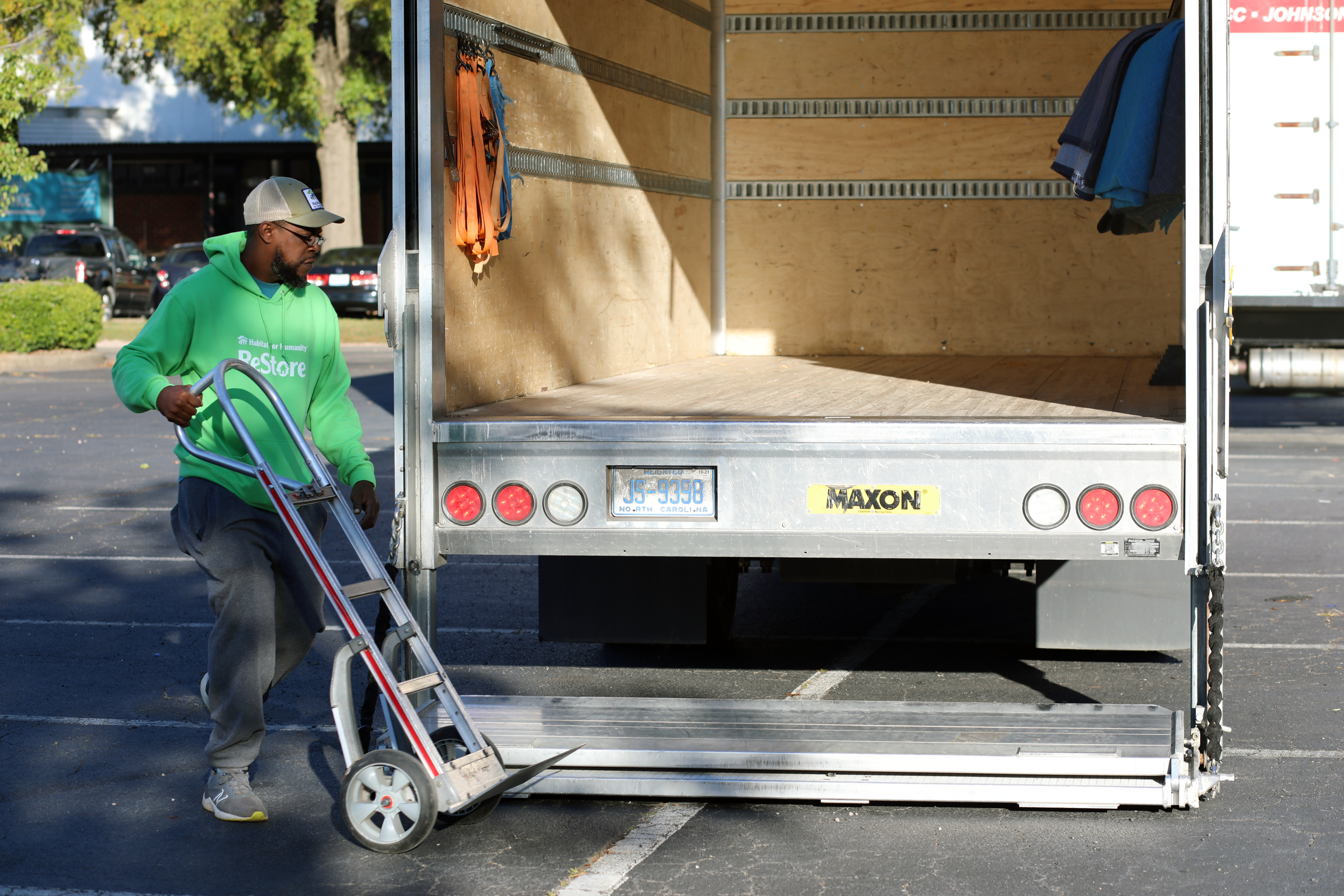 Donation driver with hand truck 