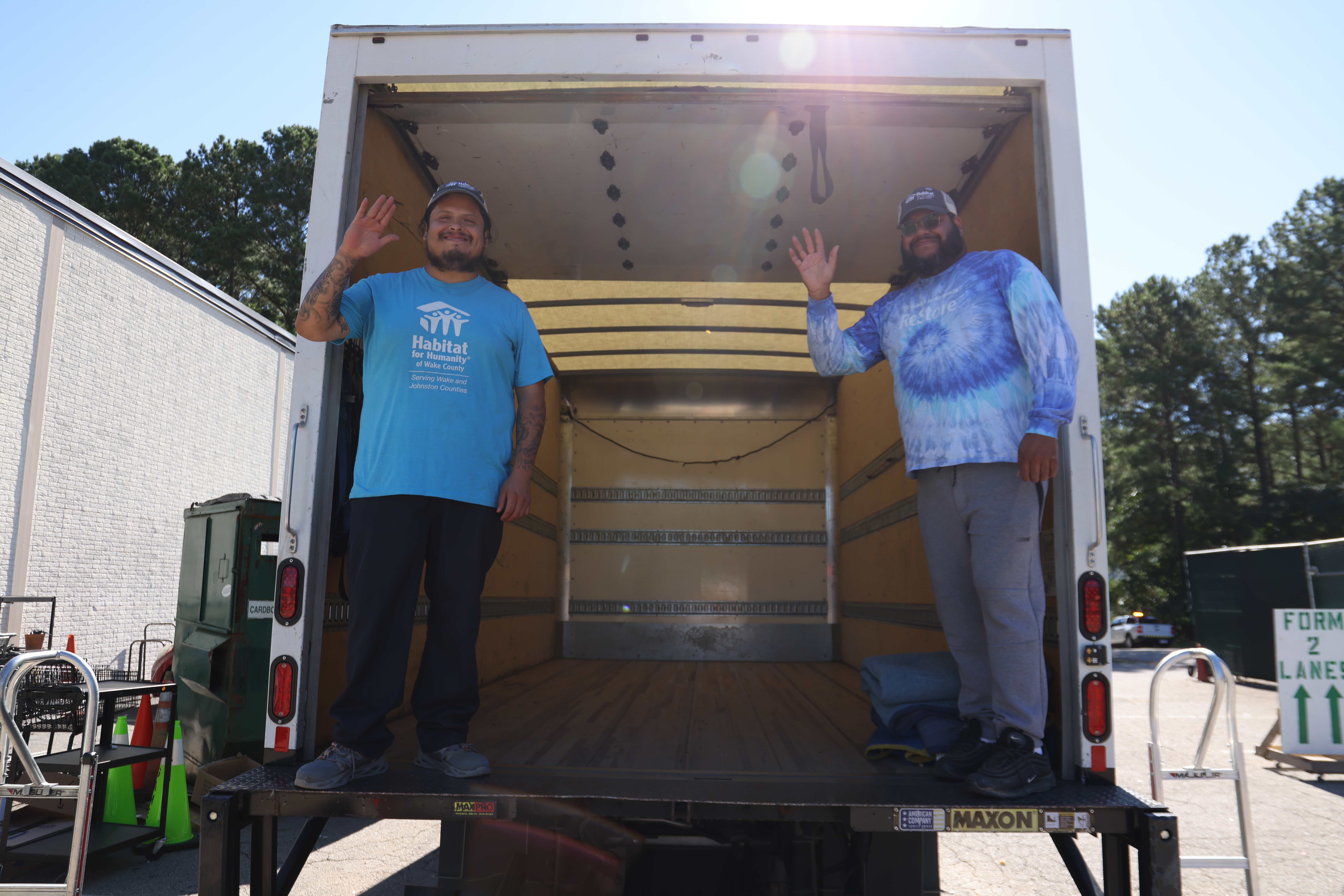 Donation pickup drivers in donation pickup truck