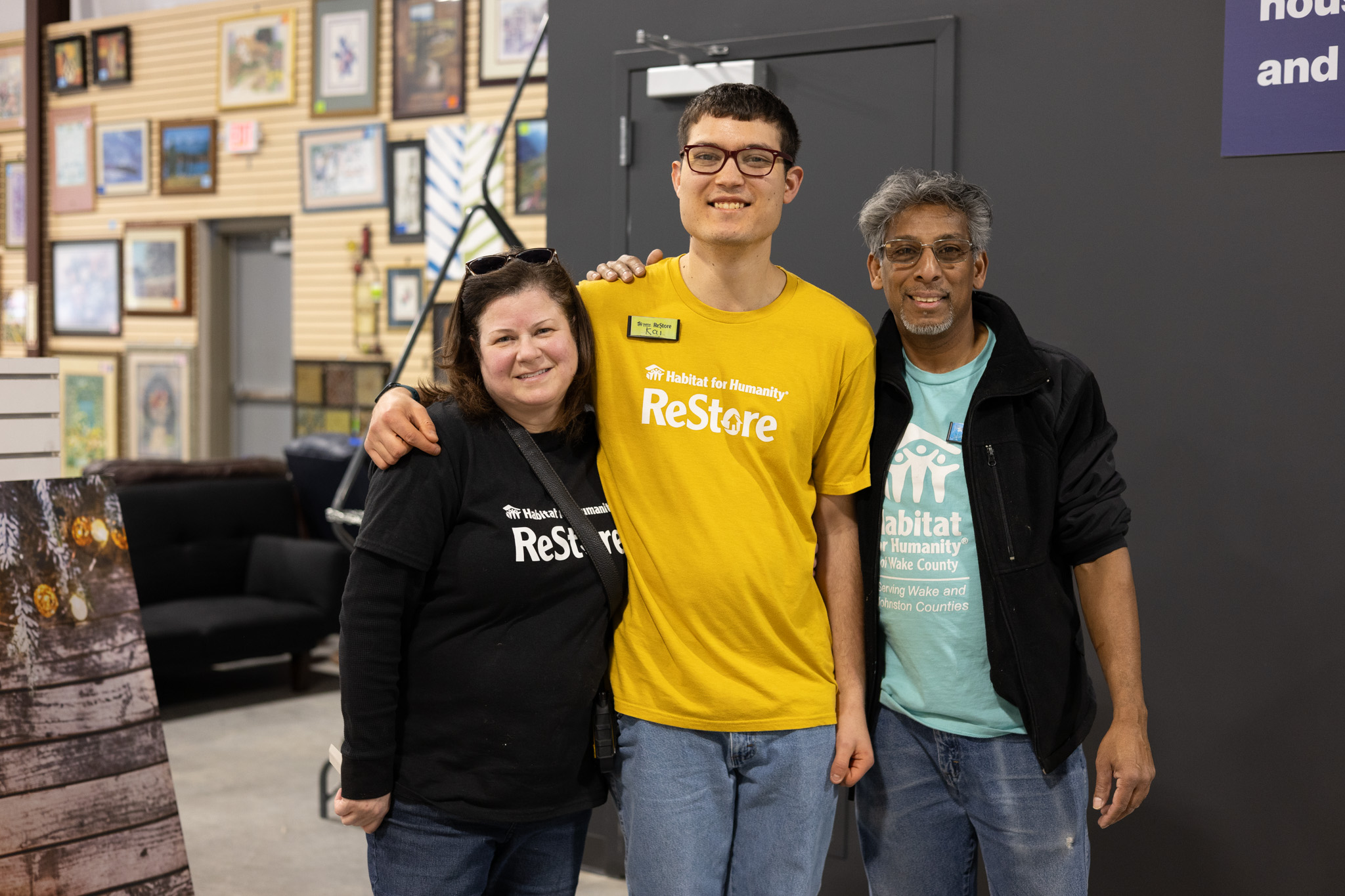 core volunteer Kai Christopher with Clayton ReStore staff